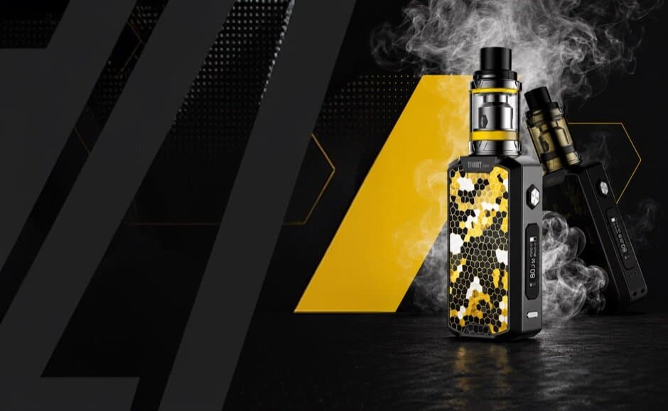 Two vape mod kits wrapped in rising smoke on a dark backdrop with a gold chevron